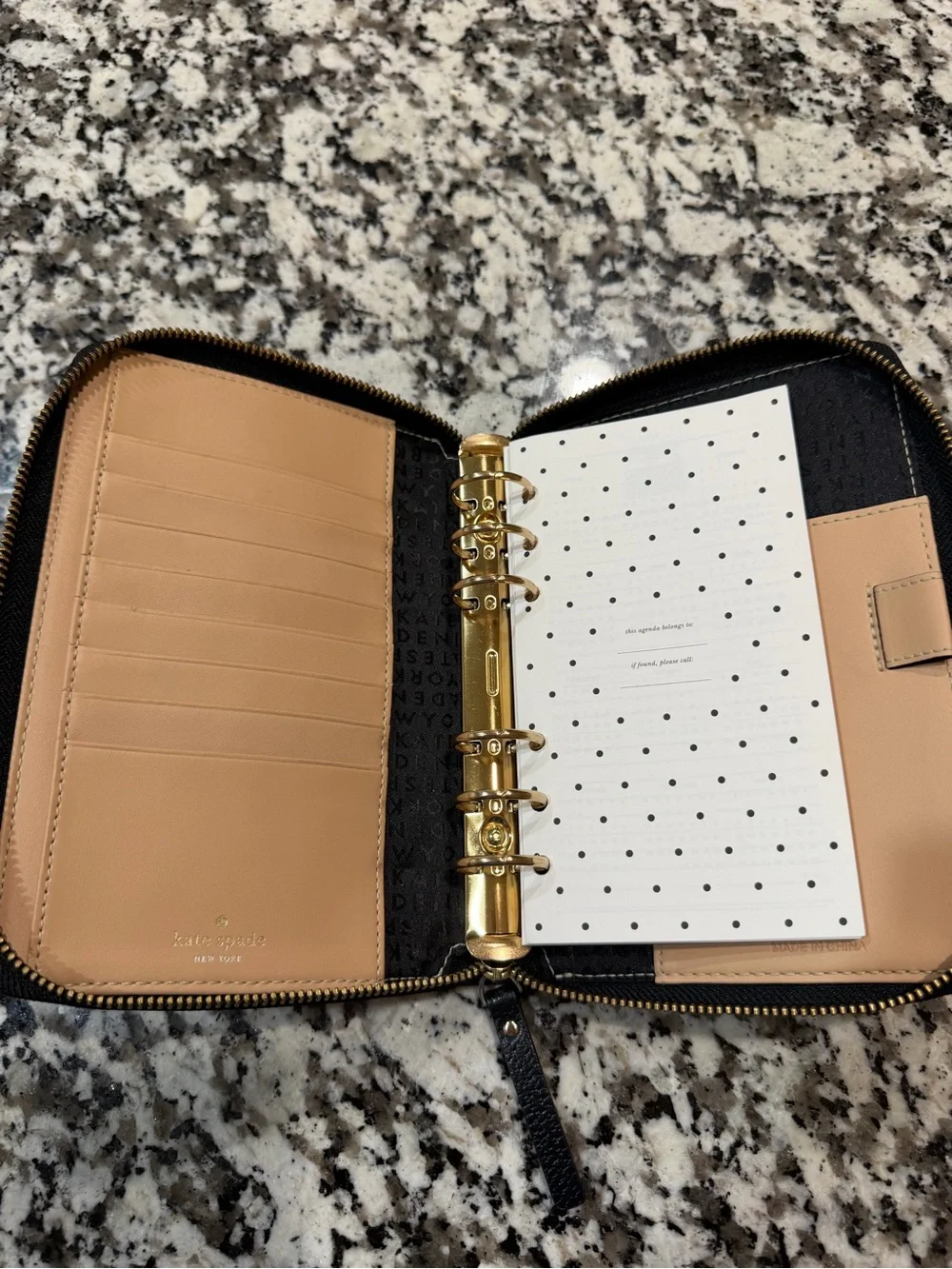 kate spade Black Pebbled Leather Zip Wallet with Gold Logo